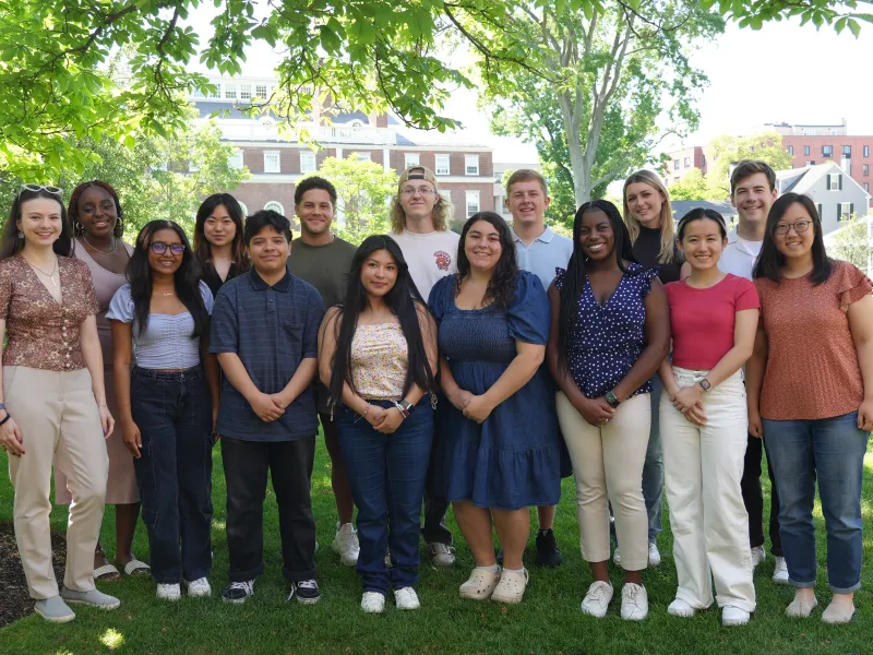 Student Interns posed on the grass of Radcliffe Institute.