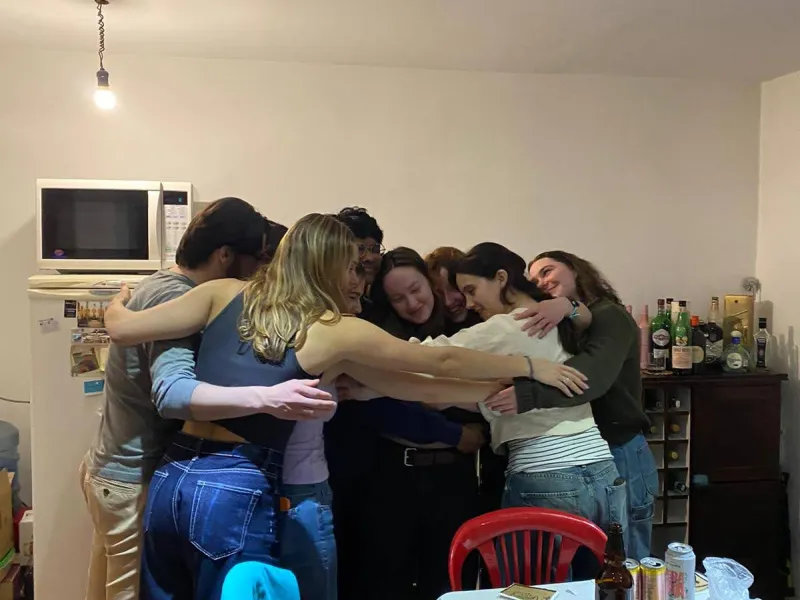 Rafid in the middle of a giant group hug with his friends from study abroad in Ushuaia, Argentina.