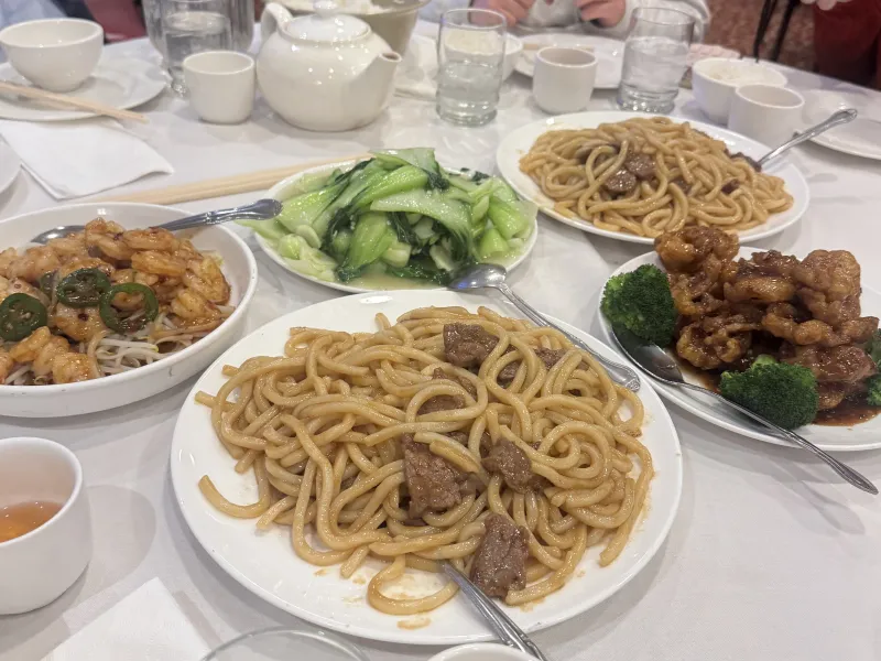 A picture of food, including noodles and chicken, ordered at Jade Garden.