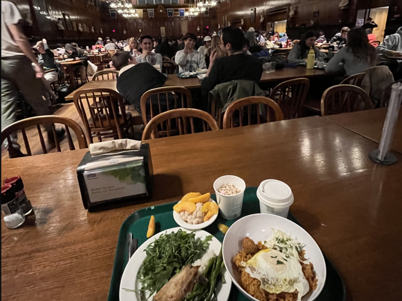 A view of Annenberg hall with a table with food in a tray.