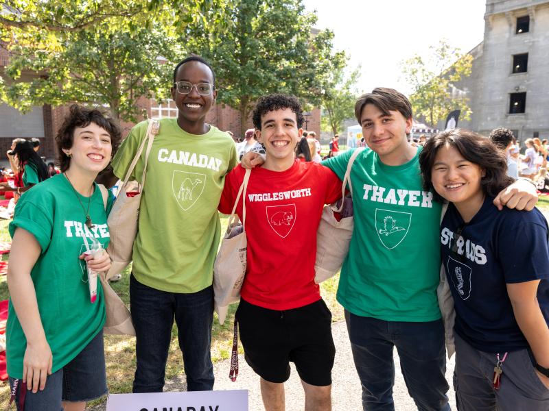 Members of the Harvard College Class of 2029 smile for a photo together.