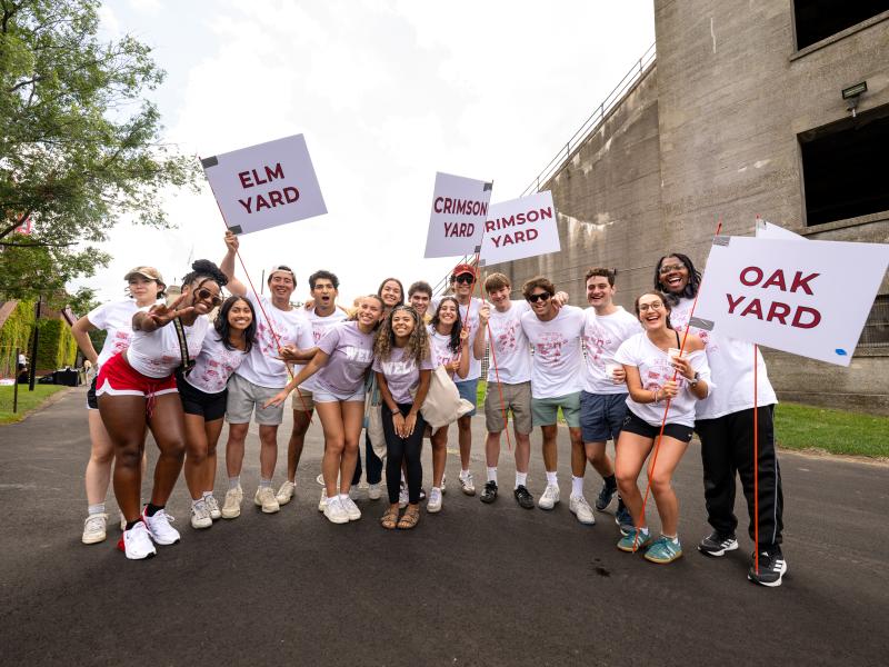 Members of the Class of 2029 celebrate with a group photo after Crimson Kickoff.