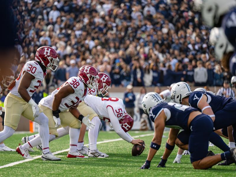 Harvard set up to snap the football.