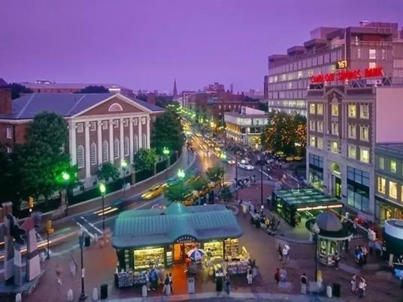 Picture of Harvard Square with purple sky