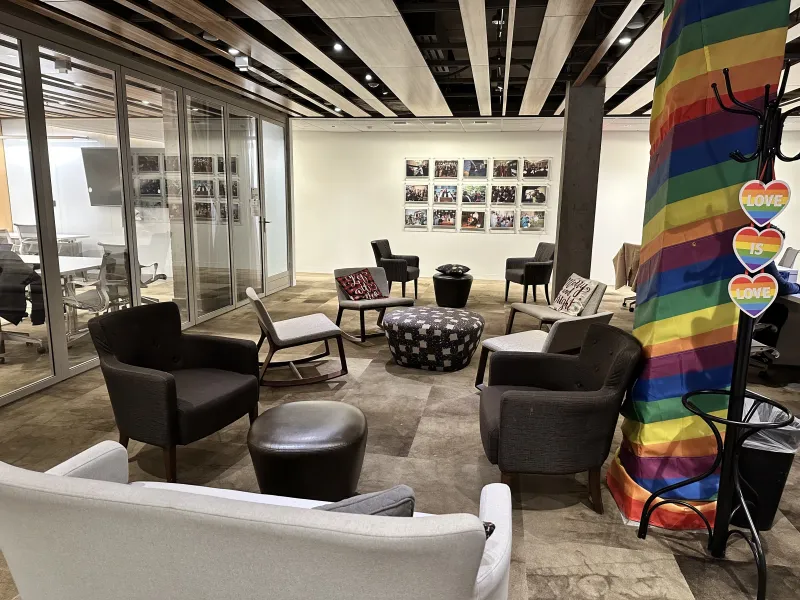 Colorful and various seats arranged sporadically in the room.