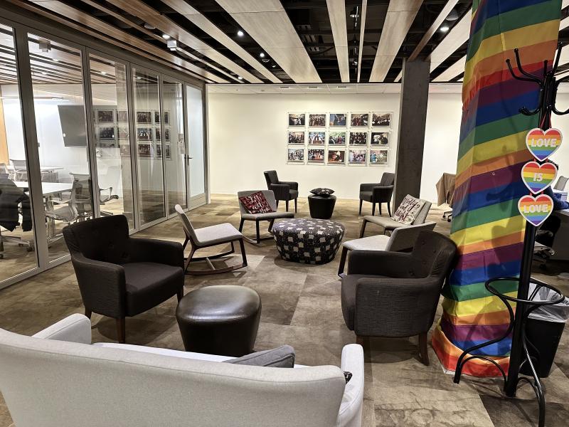 Colorful and various seats arranged sporadically in the room.