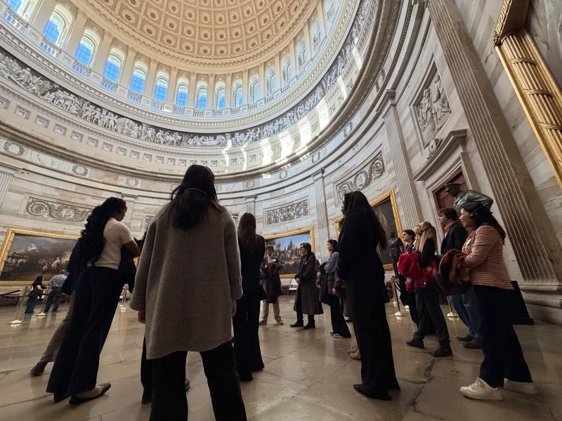 Students standing in the Capitol Rotunda during a guided tour.