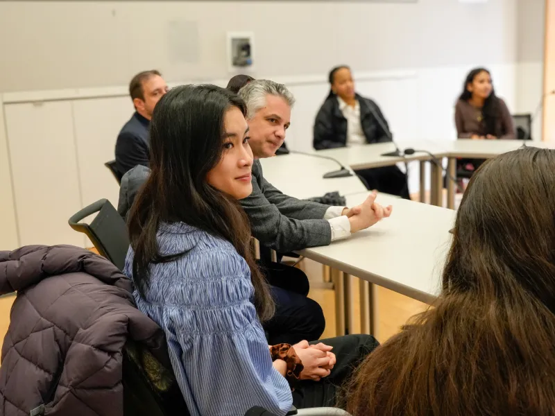 Student Kaitlyn listens to a speech during the Wintersession orientation.