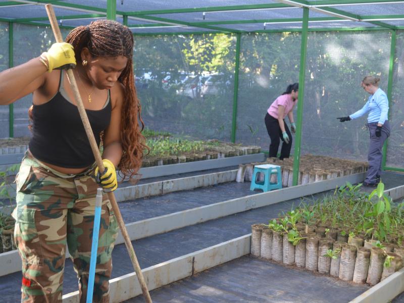 Uzochi Orji ‘29 cleaning up in the nursery.