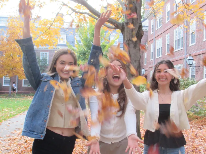 Friends and I throwing leaves