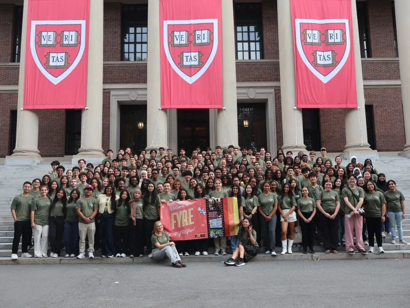 A First-Year Retreat & Experience pre-orientation group photo by Widener Library