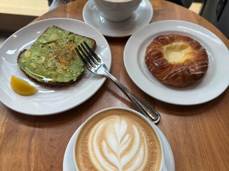 Coffees, pastries, and avocado toast