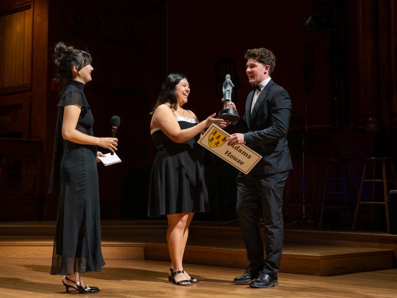 Members of Adams House Adams House accepting the award for Best Choreography onstage.