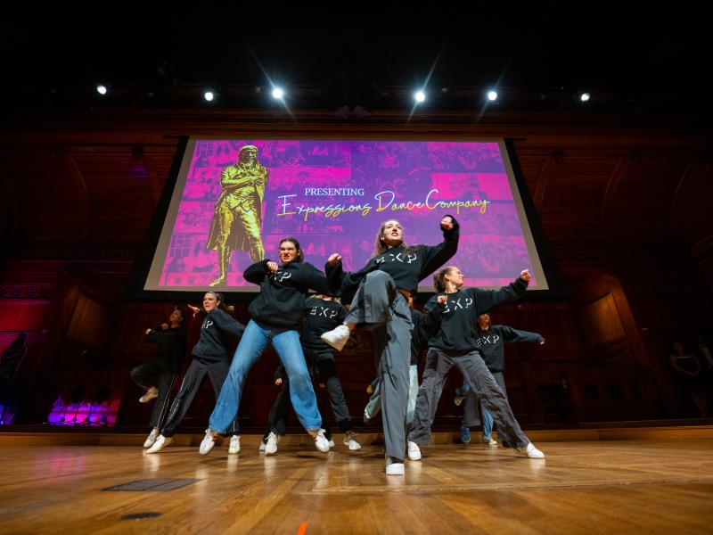 Student dancers performing onstage. 