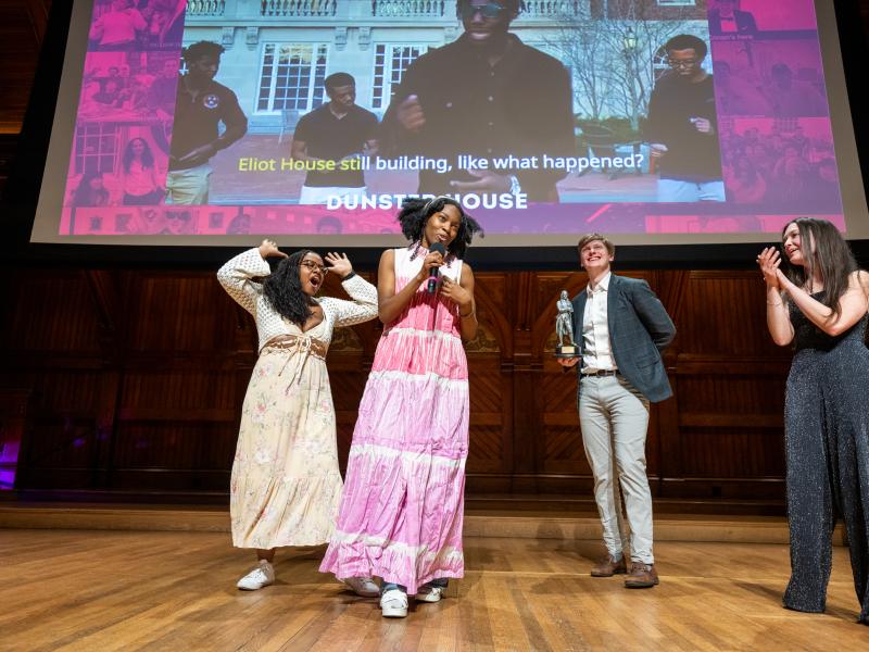 Students of Dunster House onstage accepting the Best Lyrics award.