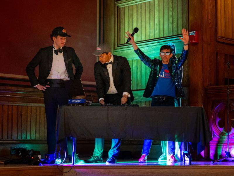 Student DJs performing onstage.