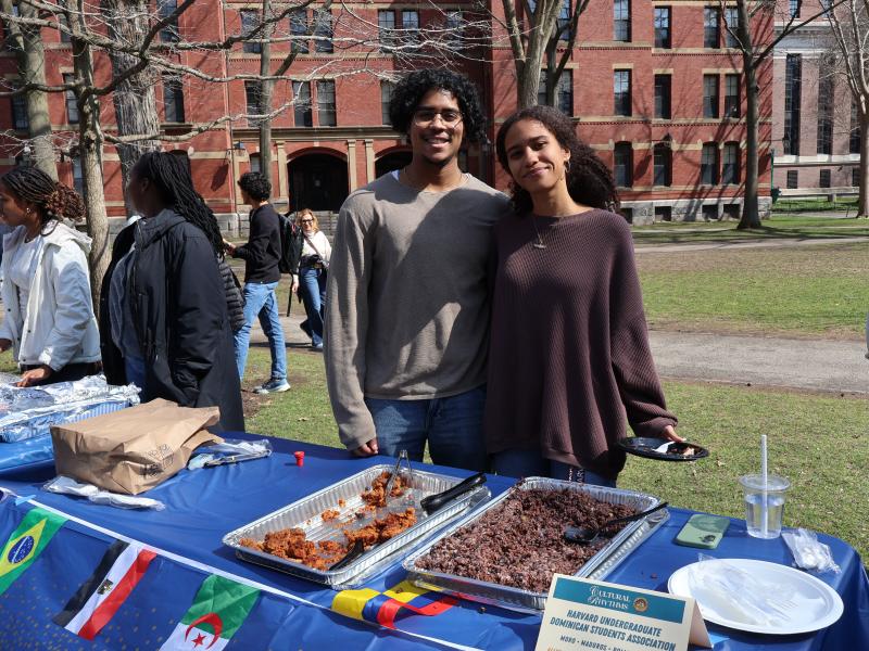 A group of students from the Harvard Undergraduate Dominican Students Association tabling at the Cultural Rhythms Food Festival.