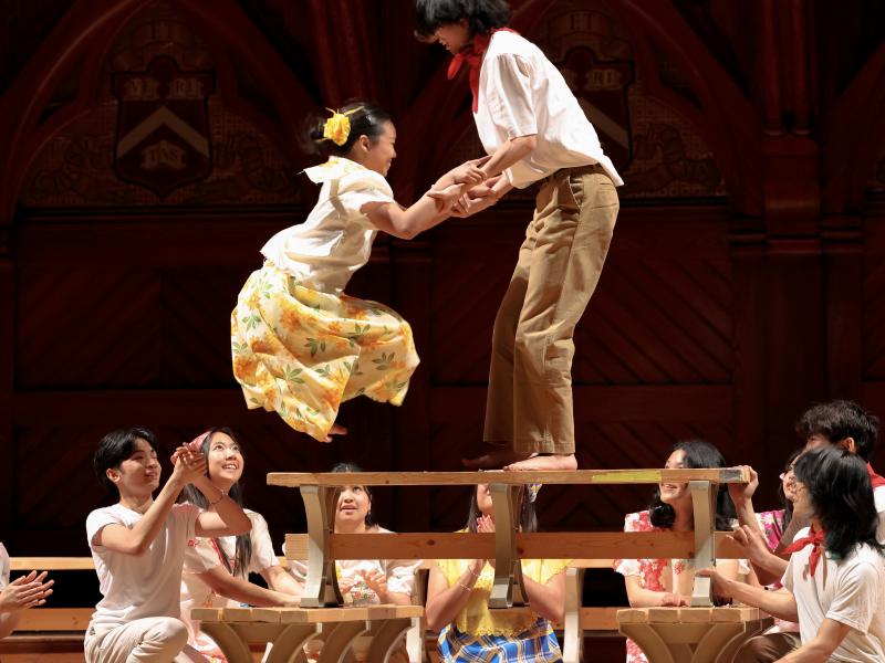Dancers from the Harvard Undergraduate Philippine Forum performing the traditional Filipino dance “Sayaw sa bangko” (“Dance on a Bench”) at the 40th Annual Cultural Rhythms Show.