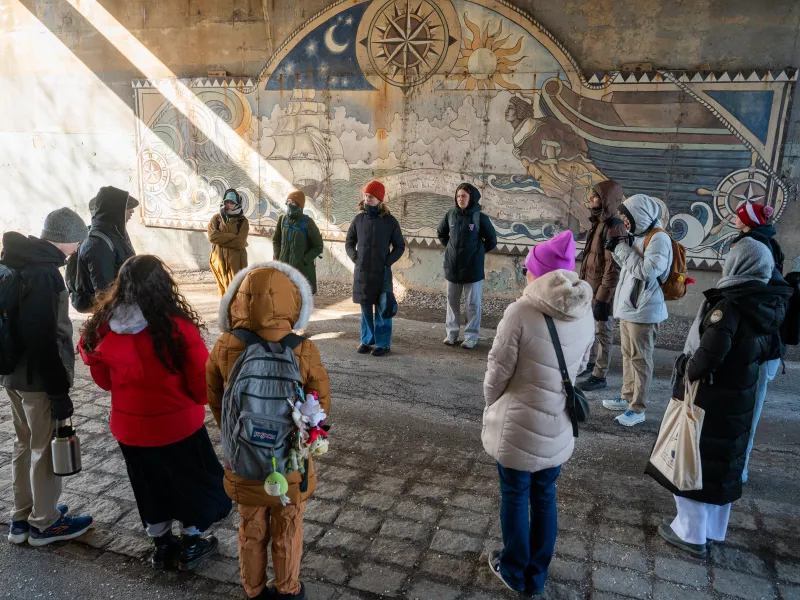 The group standing in a large circle.