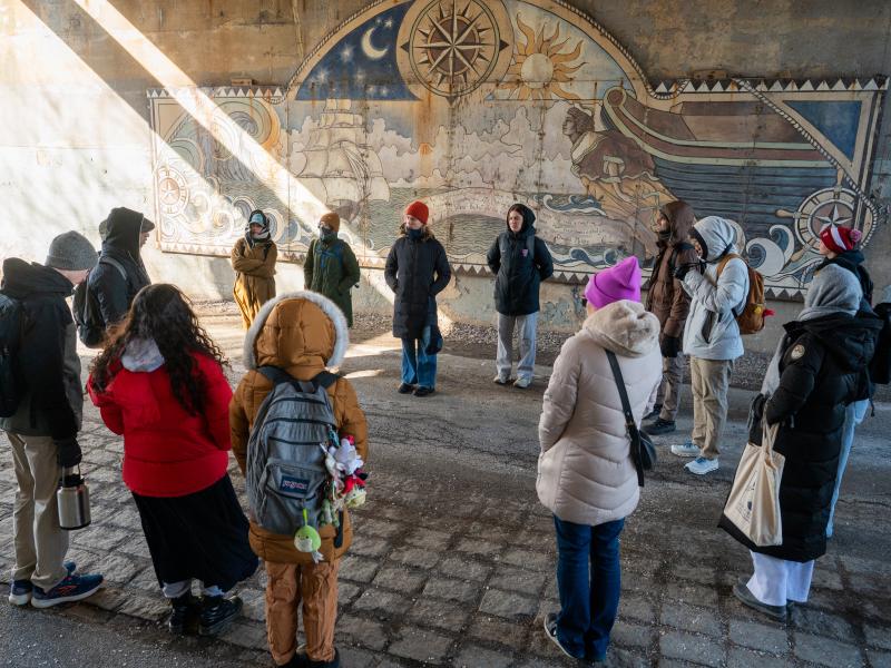 The group standing in a large circle.