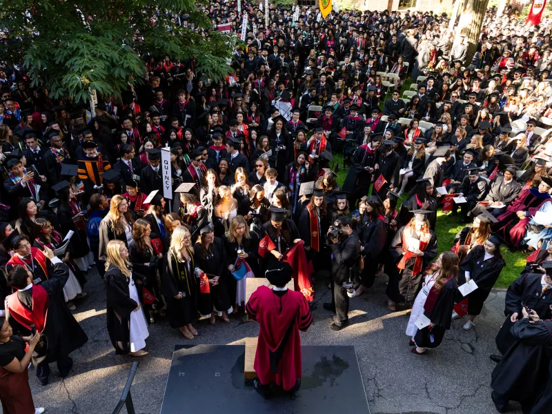 An aerial shot of Valediction, a courtyard full of students.
