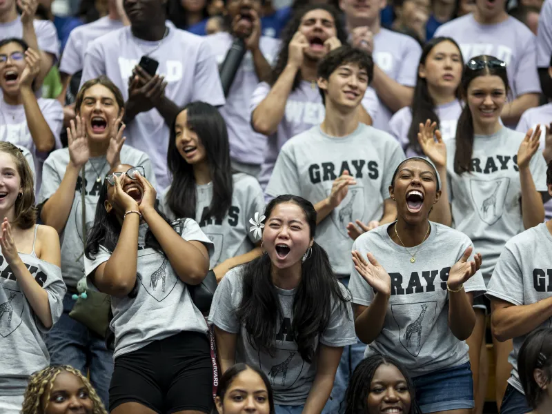 A group of students shouting during Crimson Kickoff.