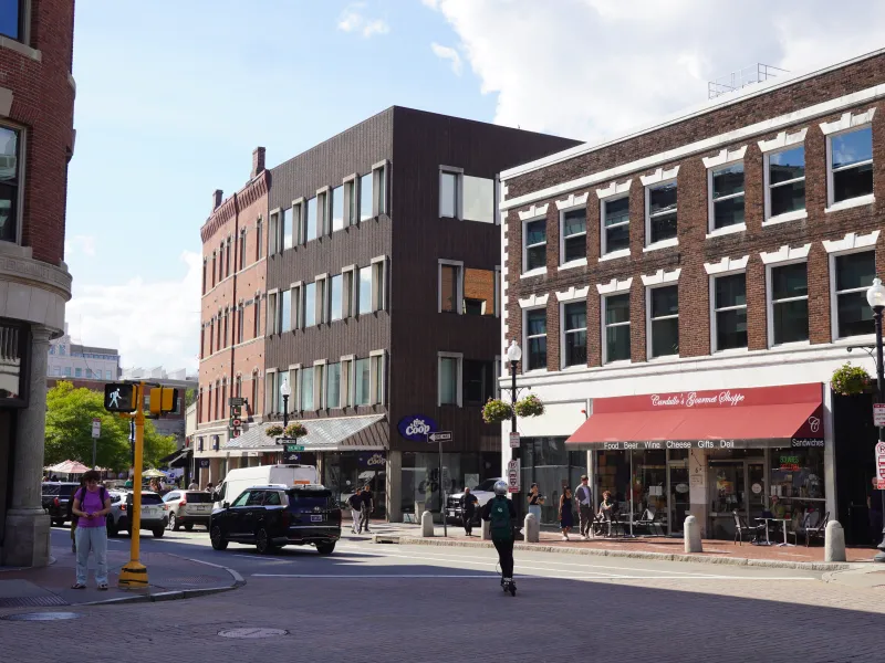 A color image of the corner of Harvard Square in 2026.
