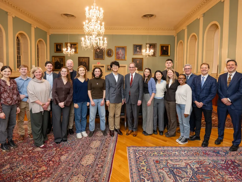 The Student Advisory Board and Faculty Advisory Board posing for a photo together.