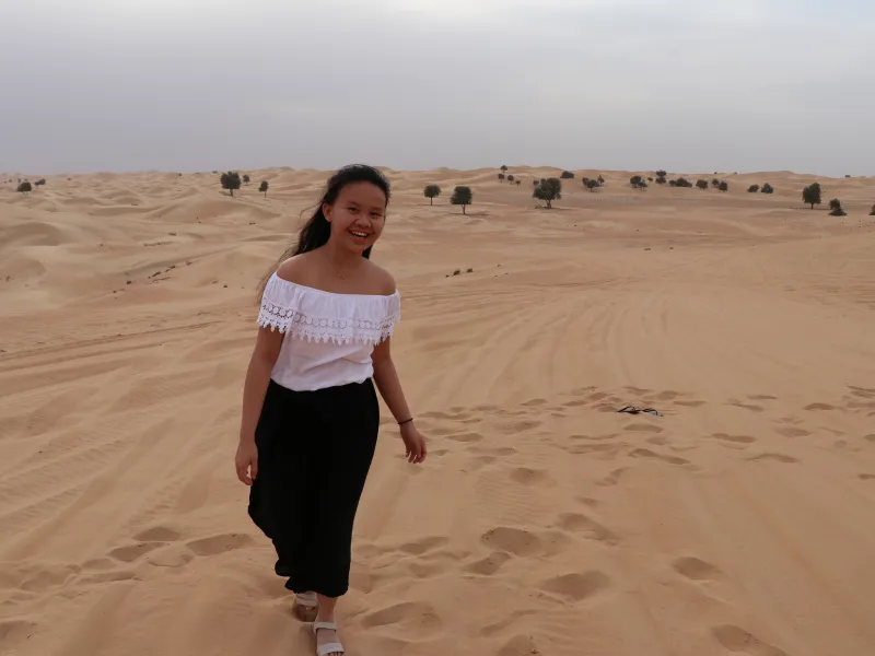 Student walking in dessert