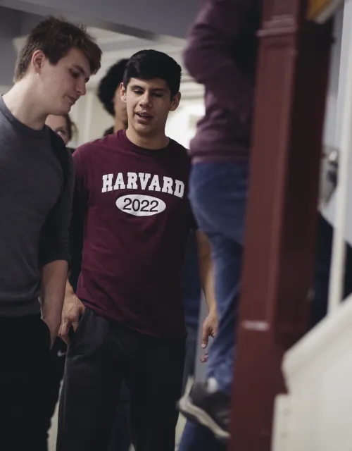 Two students walking up the stairs