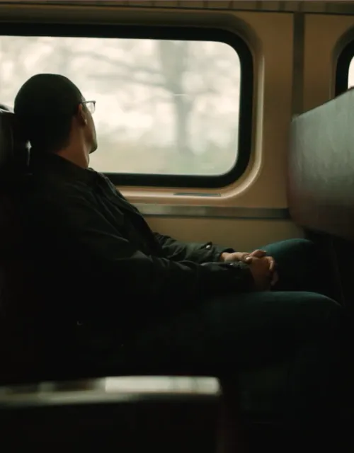 Student riding train