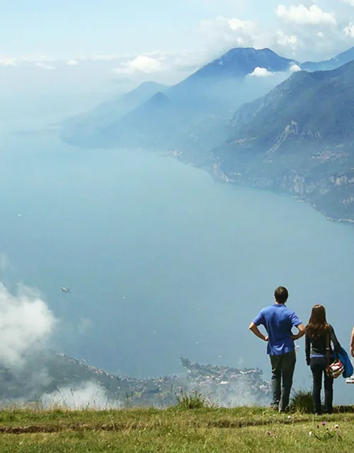 3 students in front of mountains while studying abroad