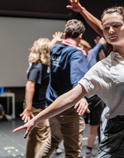 Emmaline Cook '20, who plays Graziella, rehearses choreography with the cast
