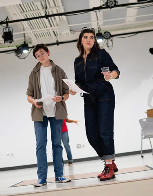 Amanda Gonzalez-Piloto ’21, Isaac Heller ’23, and Elle Shaheen ’21 kick off the first number during the rehearsal