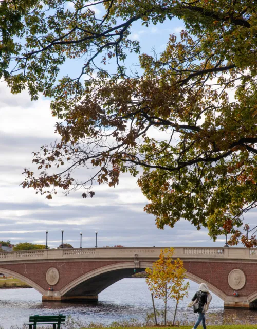 The Weeks Bridge crosses the Charles River, connecting Harvard's campuses.
