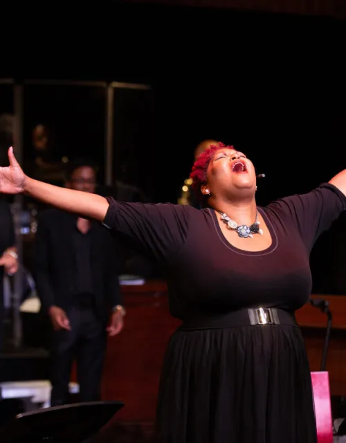 De-Rance Blaylock, a former teacher of Michael Brown, leads the “Antigone in Ferguson” choir.