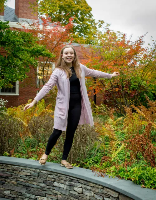 First-year Caitlin Berne stands in Harvard Yard.
