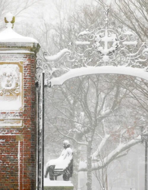Harvard Gates and John Harvard Statue in the Snow