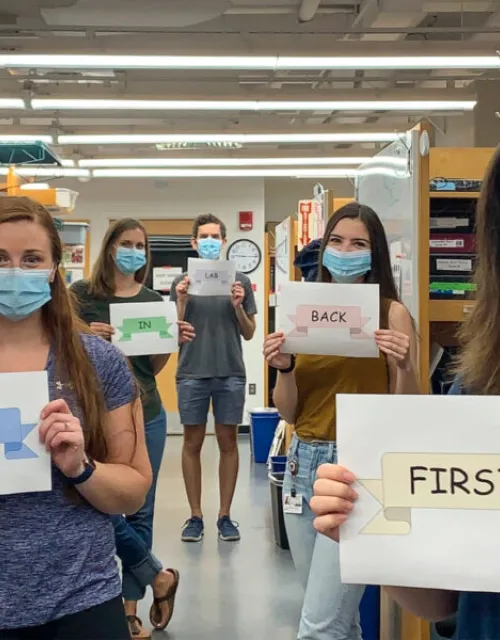 Manning Lab members celebrate their first day back in the lab in June 2020.