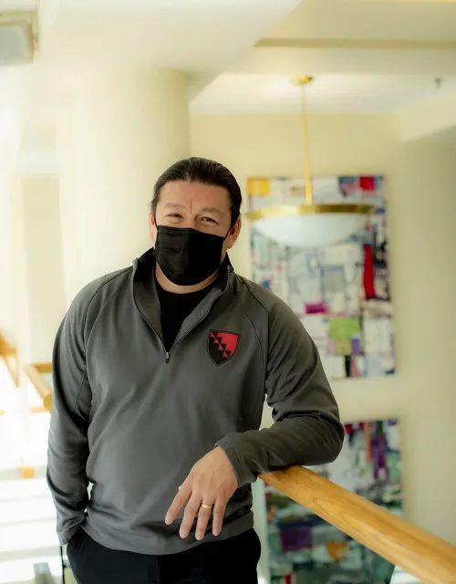 Donning a different piece of Pfoho garb from his vast collection, Mario Leon posts to Instagram to stay connected with the students.