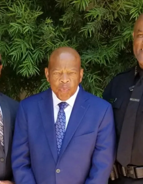 Victor Clay (far right) with Rep. John Lewis and Gregory Powell, Clay’s second-in-command at Caltech. Lewis spoke at Caltech’s 2018 commencement.