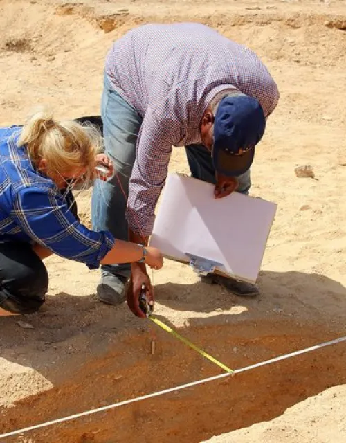 Kate Rose (left) working with colleagues at Amarna, an Egyptian archaeological site.