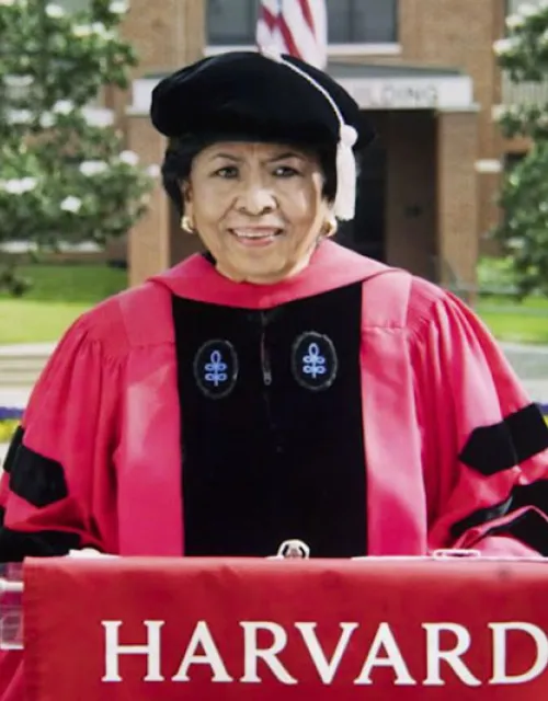Ruth Simmons in  Harvard Graduation Regalia  at a podium during her Graduation speech to the class of 2021