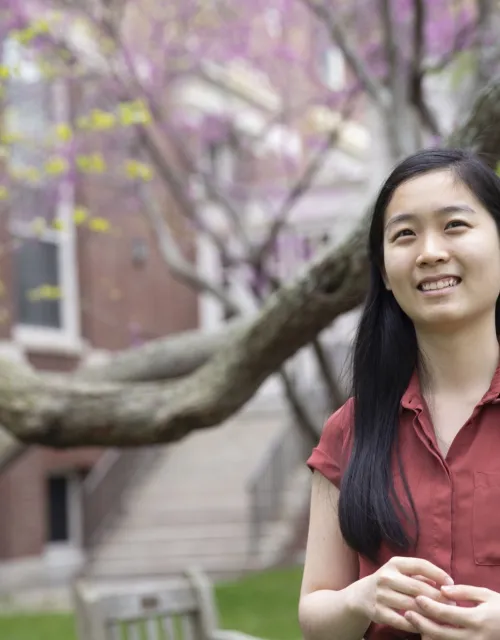 Truelian looking at the camera at Harvard