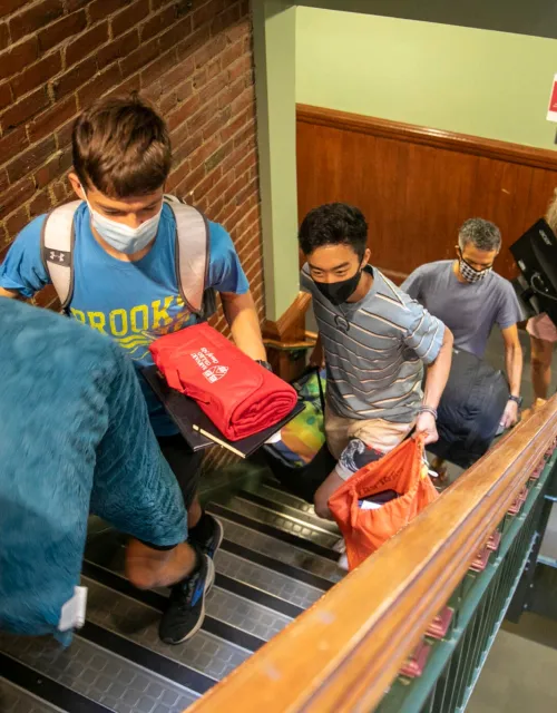 Keegan Harkavy ’25 (from left) leads the way. Matt Tengtrakool ’25 is followed by Harkavy’s parents, Brad Harkavy and Ann Marie Mador.