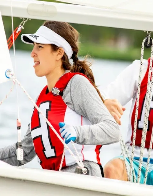 Harvard sailing team members Katie Barkin and Paul Kuechler, both ’22, navigate a drill on the Charles.