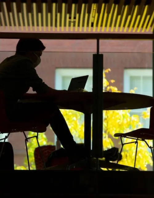 The Harvard community will continue to wear masks and distance while indoors.