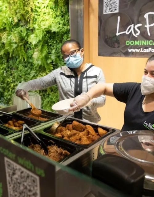 Maritza Hernandez (left) and Delores Martinez showcase Las Palmas’ featured fare.