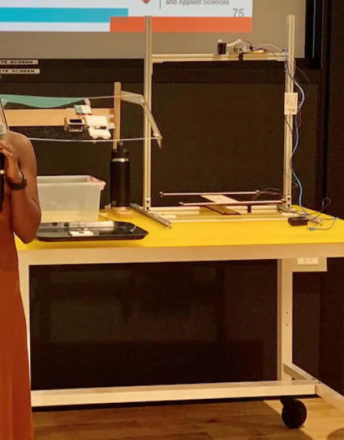 Kaylee Cornelius, '23, presents her team's prototypes to the Harvard Office for Sustainability at the Science and Engineering Complex in Allston.