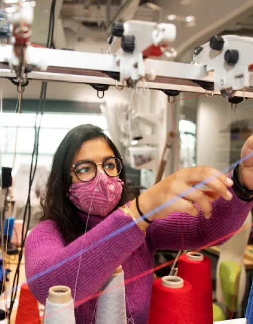 Kausalya Mahadevan, a Ph.D. candidate in mechanic engineering and materials science, designs knit fabrics with unusual mechanical behaviors, such as multistability, for use in wearable devices and functional garments. 